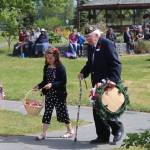 People participate in the Memorial Day ceremony at Leif Hansen Memorial Park in Kenai, Alaska, on Monday, May 30, 2022. (Camille Botello/Peninsula Clarion)