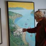 Thor Evenson gets an early look at his exibition at the Kenai Art Center on Tuesday, May 31, 2022. (Camille Botello/Peninsula Clarion)