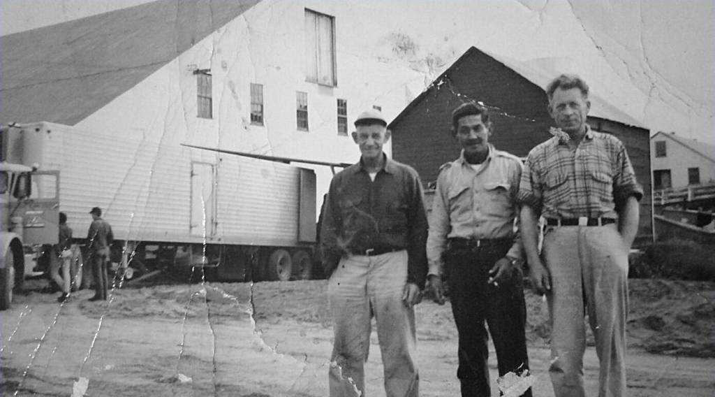 Kenai cannery owner Harold Daubenspeck, right, stands with Peter Kalifornsky, center, and an unidentified man. The photo, circa 1950s-1960s, was provided by the Facebook page A Work in Progress: Growing up on the Kenai.