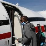 Darryl Magen boards his flight at the Kenai Municipal Airport on Friday, June 3, 2022, on his way to this years Special Olympics USA Games in Orlando, Florida. (Camille Botello/Peninsula Clarion)