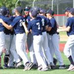 The Soldotna baseball team celebrates winning the Division II state tournament Saturday, June 4, 2022, at Wasilla High School in Wasilla, Alaska. (Photo by Jeff Helminiak/Peninsula Clarion)