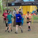 The seven runners left in the Tsalteshi Backyard Ultra ѠDave Short, Zach Behney, Sean Goff, Carrie Setian, Kent Peterson, Yvonne Leutwyler and Rustin Hitchcock Ѡtake off on their fifth lap of the 4.167-mile loop Friday at 9 p.m. Runners will keep doing the loop each hour until only the winner remains. The winner gets a ticket to the Tartarus Backyard Ultra in Spokane, Washington, on July 30. There were 15 runners at the start of the Tsalteshi Backyard Ultra. (Photo by Jeff Helminiak/Peninsula Clarion)