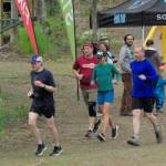The seven runners left in the Tsalteshi Backyard Ultra ѠDave Short, Zach Behney, Sean Goff, Carrie Setian, Kent Peterson, Yvonne Leutwyler and Rustin Hitchcock Ѡtake off on their fifth lap of the 4.167-mile loop Friday at 9 p.m. Runners will keep doing the loop each hour until only the winner remains. The winner gets a ticket to the Tartarus Backyard Ultra in Spokane, Washington, on July 30. There were 15 runners at the start of the Tsalteshi Backyard Ultra. (Photo by Jeff Helminiak/Peninsula Clarion)