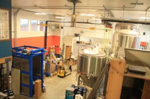 The distillery of the Kenai River Brewing Company in Soldotna, Alaska, is seen in April 2018. Gov. Mike Dunleavy signed into law Senate Bill 9 on Thursday, June 16, 2022. Sponsored by Sen. Peter Micciche, R-Soldotna, the bill overhauls states alcohol regulations, including creating several new retail license types, such as for breweries, wineries and distilleries, and allowing those businesses to stay open later. (Photo by Erin Thompson/Peninsula Clarion)