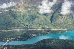 An area cleared to make way for the Cooper Landing bypass project can be seen above the intersection of the Kenai River and Kenai Lake in Cooper Landing, Alaska, on Sept. 6, 2021. (Photo by Jeff Helminiak/Peninsula Clarion)