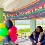 Michael S. Lockett / Juneau Empire
Sherry Patterson, president of the Black Awareness Association in Juneau, looks out as the group sells sweet potato pies as a fundraiser for a college scholarship fund during a Juneteenth celebration on Sunday, June 19, 2022, in Juneau, Alaska.