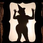 Frankie Doom, a headliner and specialist in macabre drag costuming, prepares to make entrance at Glitz, a major annual drag event celebrated every Pride Month, at Centennial Hall on June 18, 2022. (Michael S. Lockett / Juneau Empire)