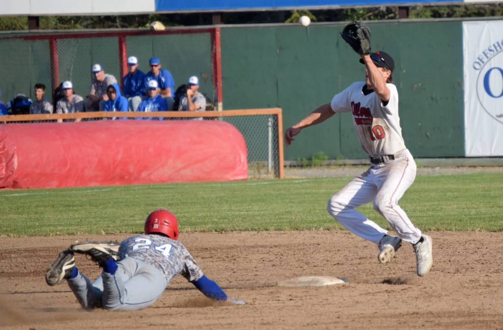 Oilers shortstop Trey Becker gets ready to tag out Grant Weiss of the Anchorage Glacier Pilots on Thursday, June 23, 2022, at Coral Seymour Memorial Park in Kenai, Alaska. (Photo by Jeff Helminiak/Peninsula Clarion)