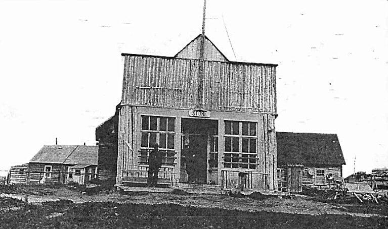 This grainy photo from 1911-12, showing Frenchy Vian and William Dawson in front of their Kenai trading post, was the first exposure Clark Fair had to the mysterious Frenchy V. (Photo provided by the Kenai Historical Society)