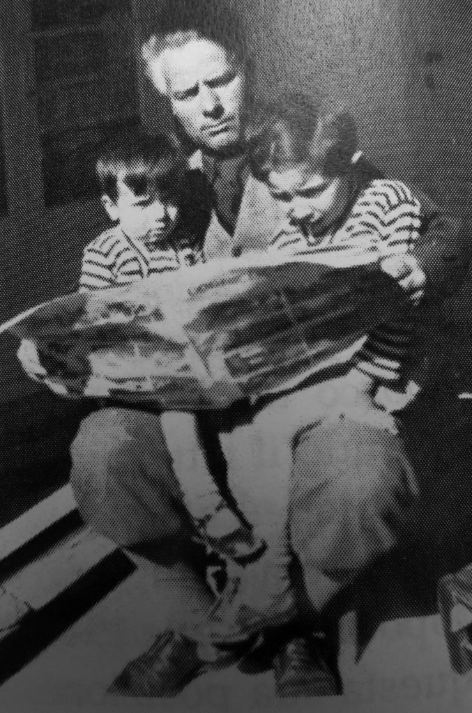 Giò Viani (center) reads to his two sons, Rinantonio (left) and Ioseph, in about 1936. When Rino was a boy, his father also used to regale his sons with stories about his adventurous Uncle Frenchy, who spent about 20 years in Kenai.