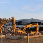 Buldozers sit outside of the former Kenai Bowling Alley on Thursday, June 23, 2022, in Kenai, Alaska. (Ashlyn OHara/Peninsula Clarion)