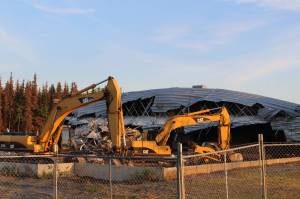 Buldozers sit outside of the former Kenai Bowling Alley on Thursday, June 23, 2022, in Kenai, Alaska. (Ashlyn OHara/Peninsula Clarion)