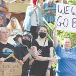 Ben Hohenstatt / Juneau Empire 
Demonstrators on Saturday hold signs across from the Alaska State Capitol in Juneau. The protest, which drew hundreds to the Dimond Courthouse Plaza, was among many held nationwide in the wake of the U.S. Supreme Courts decision to overturn Roe.