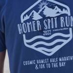 Christian Seager shows his 2022 Homer Spit Run, with the line "in memory of Gary Williams." Williams, a former Homer Mayor and a former owner of the Homer News, helped start the Spit Run. (Photo by Michael Armstrong/Homer News)