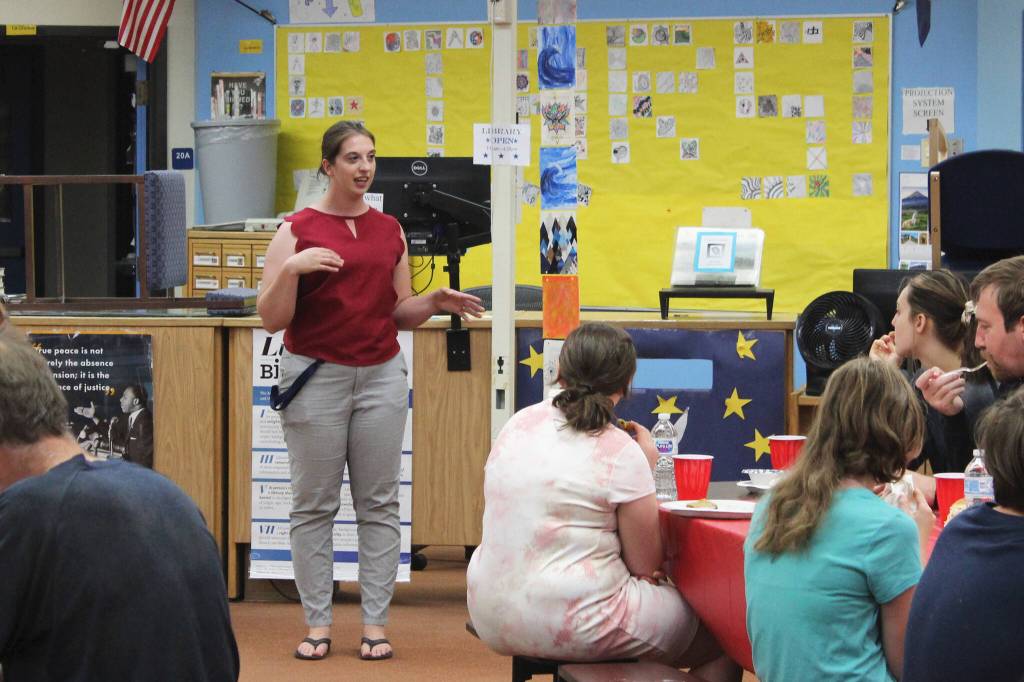 KPBSD Summer Work Program Coordinator Olivia Orth welcomes guests to a program celebration in the Soldotna High School Library on Tuesday, June 28, 2022, in Soldotna, Alaska. (Ashlyn OHara/Peninsula Clarion)