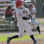 Post 20 Twins catcher Jacob Belger flies out against the Napoleon (Ohio) Post 300 River Bandits at the Bill Miller/Lance Coz Wood Bat Tournament on Thursday, June 30, 2022, at Coral Seymour Memorial Park in Kenai, Alaska. (Photo by Jeff Helminiak/Peninsula Clarion)