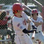 Post 20 Twins catcher Jacob Belger flies out against the Napoleon (Ohio) Post 300 River Bandits at the Bill Miller/Lance Coz Wood Bat Tournament on Thursday, June 30, 2022, at Coral Seymour Memorial Park in Kenai, Alaska. (Photo by Jeff Helminiak/Peninsula Clarion)
