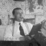 Photo courtesy of the Viani Family Collection 
P.F. Frenchy Vian poses with a cigar and some reading material, probably circa 1920, in an unspecified location.