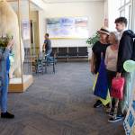 Mark Sabbatini / Juneau Empire
Iryna Hrynchenko takes a photo of Bridget Smith, Joyanne Bloom and Hrynchenkos 18-year-old son Ivan inside Juneau International Airport on Saturday, June 25, 2022.