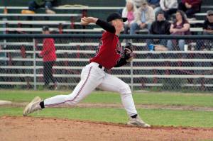 Peninsula Oilers starter Carson Seeman delivers to the Mat-Su Miners on Sunday, July 3, 2022, at Coral Seymour Memorial Park in Kenai, Alaska. (Photo by Jeff Helminiak/Peninsula Clarion)