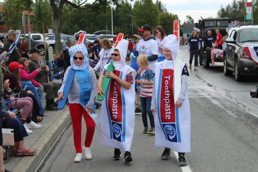 Community businesses and organizations participate in the annual Independence Day parade in downtown Kenai, Alaska, on Monday, July 4, 2022. (Camille Botello/Peninsula Clarion)