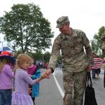 People line the streets in downtown Kenai, Alaska on Monday, July 4, 2022 for the annual Independence Day parade. (Camille Botello/Peninsula Clarion)