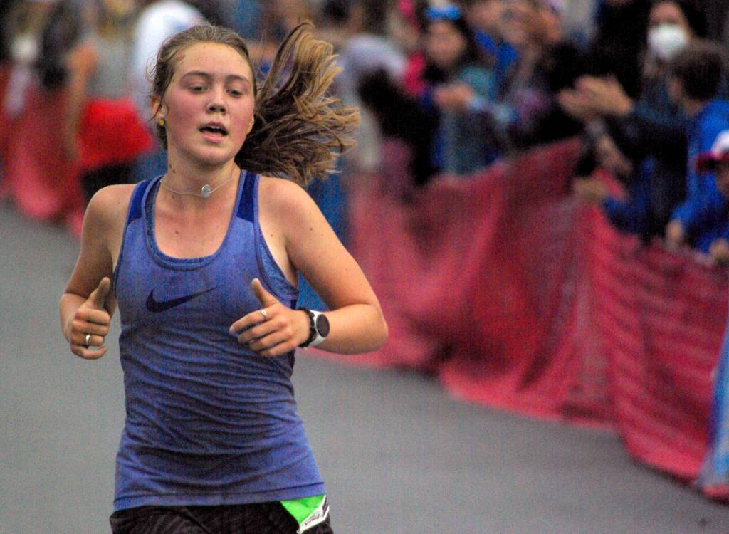 Rosie Conway of Anchorage wins the girls junior Mount Marathon Race on Monday, July 4, 2022, in Seward, Alaska. (Photo by Jeff Helminiak/Peninsula Clarion)
