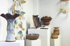 Pottery pieces are displayed as a part of the Kenai Potters Guild July show at the Kenai Art Center on Tuesday, July 5, 2022. (Camille Botello/Peninsula Clarion)