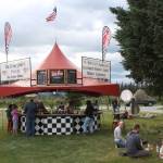 Community members attend the RockN the Ranch at the RustyRavin Music Festival in Kenai, Alaska, on Friday, July 8, 2022. (Camille Botello/Peninsula Clarion)