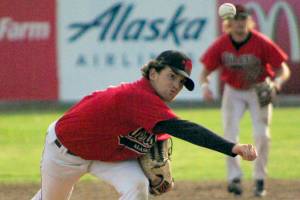 Oilers starter Conner Kershaw delivers to the Chugiak-Eagle River Chinooks on Friday, July 8, 2022, at Coral Seymour Memorial Park in Kenai, Alaska. (Photo by Jeff Helminiak/Peninsula Clarion)