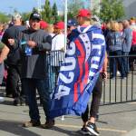A person wearing a Trump flag stands outside of the Alaska Airlines Center, where a Save America rally was being held, on Saturday, July 9, 2022, in Anchorage, Alaska. Former President Donald Trump, U.S. Senate candidate Kelly Tshibaka and U.S. House candidate Sarah Palin were among the events speakers. (Ashlyn OHara/Peninsula Clarion)
A person wearing a Trump flag stands outside of the Alaska Airlines Center, where a Save America rally was being held, on Saturday, July 9, 2022, in Anchorage, Alaska. Former President Donald Trump, U.S. Senate candidate Kelly Tshibaka and U.S. House candidate Sarah Palin were among the events speakers. (Ashlyn OHara/Peninsula Clarion)