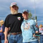 David (left) and April (right) Orth wait to enter the Alaska Airlines Center for a Save America rally on Saturday, July 9, 2022, in Anchorage, Alaska. Former President Donald Trump, U.S. Senate candidate Kelly Tshibaka and U.S. House candidate Sarah Palin were among the events speakers. (Ashlyn OHara/Peninsula Clarion)