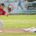 OIlers second baseman Graiden West gets ready to tag out Justin Grech of the Chugiak-Eagle River Chinooks on a steal attempt Sunday, July 10, 2022, at Coral Seymour Memorial Park in Kenai, Alaska. (Photo by Jeff Helminiak/Peninsula Clarion)
