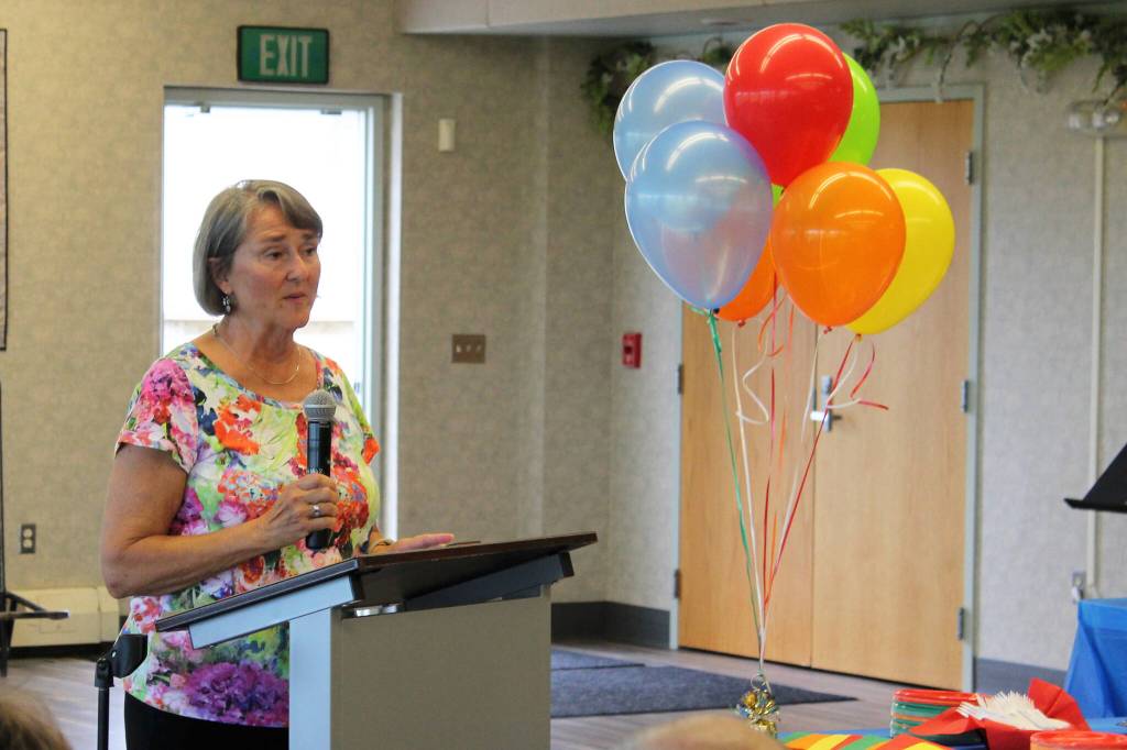 Vicke Kukowski speaks during a ceremony dedicating the Kenai Senior Centers greenhouse to her dad, Bill Osborn, on Tuesday, July 12, 2022 in Kenai, Alaska. (Ashlyn OHara/Peninsula Clarion)