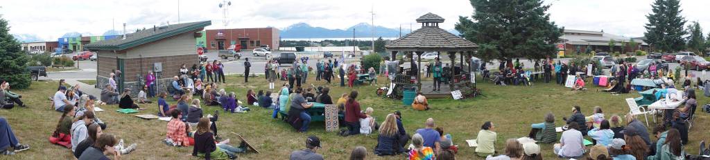 In this panormaic photo, people listen to speakers at the "Women's March: Bans Off Our Bodies" protest on Saturday, July 9, 2022, at WKFL Park in Homer, Alaska. (Photo by Michael Armstrong/Homer News)