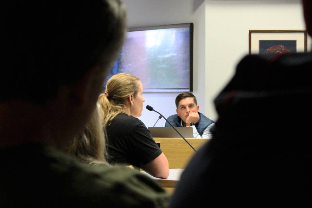 Soldotna City Council member Justin Ruffridge looks on while Tamra Wear testifies at a meeting of the council meeting on Wednesday, July 13, 2022, in Soldotna, Alaska. (Ashlyn OHara/Peninsula Clarion)