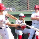 Simon Grenier of the American Legion Post 20 Twins fouls off a pitch against West on Thursday, July 14, 2022, at Coral Seymour Memorial Park in Kenai, Alaska. (Photo by Jeff Helminiak/Peninsula Clarion)