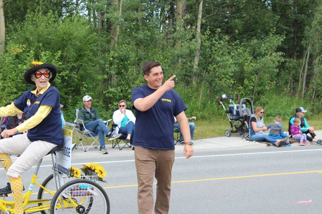 2022 Alaska State House candidate Justin Ruffridge hands out candy during the 65th annual Soldotna Progress Days Parade on Saturday, July 23, 2022, in Soldotna, Alaska. (Ashlyn OHara/Peninsula Clarion)