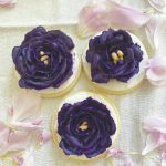 Photo by Tressa Dale/Peninsula Clarion 
Sugar cookies are decorated with flowers of royal icing.