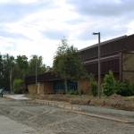 Ashlyn OHara / Peninsula Clarion
A construction crew works near the entrance of the Soldotna Regional Sports Complex on June 14.