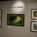 Artwork by Graham Dale hangs at the Kenai Art Center in Kenai, Alaska, on Tuesday, Aug. 2, 2022. These pieces are part of the Sites Unseen exhibition. (Jake Dye/Peninsula Clarion)