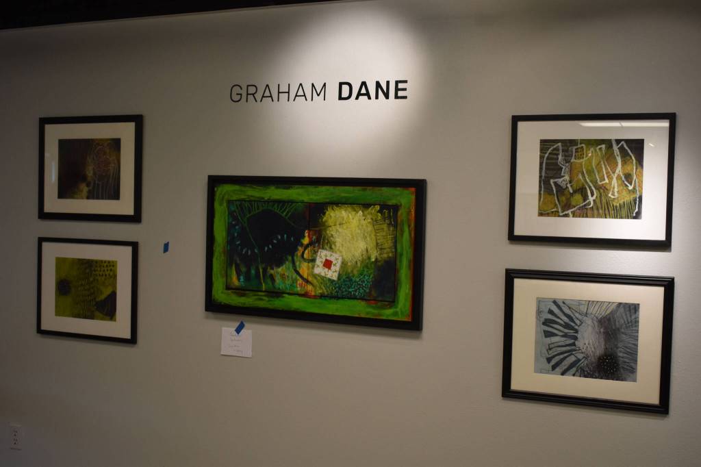 Artwork by Graham Dale hangs at the Kenai Art Center in Kenai, Alaska, on Tuesday, Aug. 2, 2022. These pieces are part of the Sites Unseen exhibition. (Jake Dye/Peninsula Clarion)