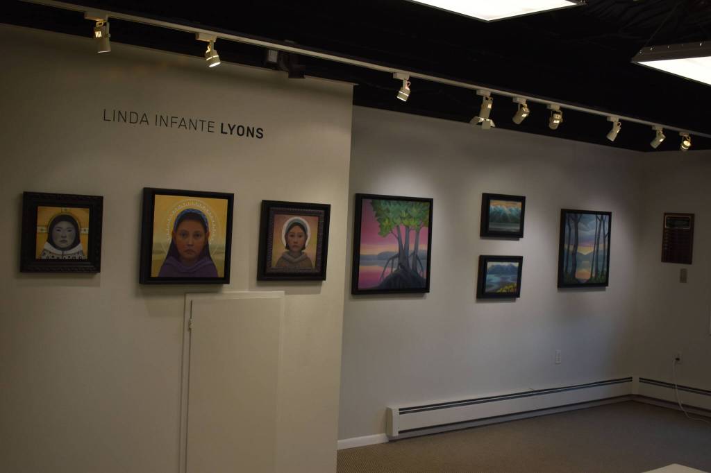 Artwork by Linda Infante Lyons hangs at the Kenai Art Center in Kenai, Alaska on Tuesday, Aug. 2, 2022. This art is part of the Sites Unseen exhiition. (Jake Dye/Peninsula Clarion)