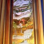 One of the gold- and silver-leaf murals of Alaska wildlife, industries and Mount McKinley hangs in the main room of the 4th Avenue Theatre in Anchorage, Alaska, on March 29, 2006. Demolition will begin in August 2022 on a once-opulent downtown Anchorage movie theater designed by the architect of Hollywoods famed Pantages Theater. The 4th Avenue Theatre with nearly 1,000 seats opened in 1947, and it withstood the second most powerful earthquake ever recorded. (AP Photo/Al Grillo, File)