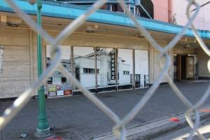Fencing surrounds the 4th Avenue Theatre in Anchorage, Alaska, on Wednesday, Aug. 3, 2022. Demolition will begin in August 2022 on the once-opulent downtown Anchorage movie theater designed by the architect of Hollywoods famed Pantages Theatre. The 4th Avenue Theatre with nearly 1,000 seats opened in 1947, and it withstood the second most powerful earthquake ever recorded. (AP Photo/Mark Thiessen)