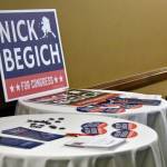 Nick Begich III campaign materials sit on tables ahead of a May 16 GOP debate held in Juneau. (Peter Segall / Juneau Empire File)