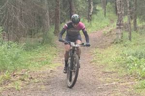 Anchorage's Will Ross rides to victory in the Soggy Bottom 100 on Saturday, Aug. 6, 2022, on Alaska's Kenai Peninsula. (Photo provided by Angela DiBeradino)