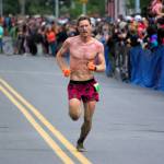 Anchorage's Lars Arneson finishes third in the men's Mount Marathon Race on Monday, July 4, 2022, in Seward, Alaska. (Photo by Jeff Helminiak/Peninsula Clarion)