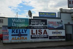 Campaign signs decorate the outside of Paradisos Restaurant on Monday, Aug. 15, 2022, in Kenai, Alaska. (Ashlyn OHara/Peninsula Clarion)