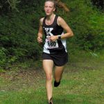 Kenai Central senior Jayna Boonstra runs to victory in a Kenai-Soldotna dual meet Monday, Aug. 15, 2022, at Tsalteshi Trails just outside of Soldotna, Alaska. (Photo by Jeff Helminiak/Peninsula Clarion)